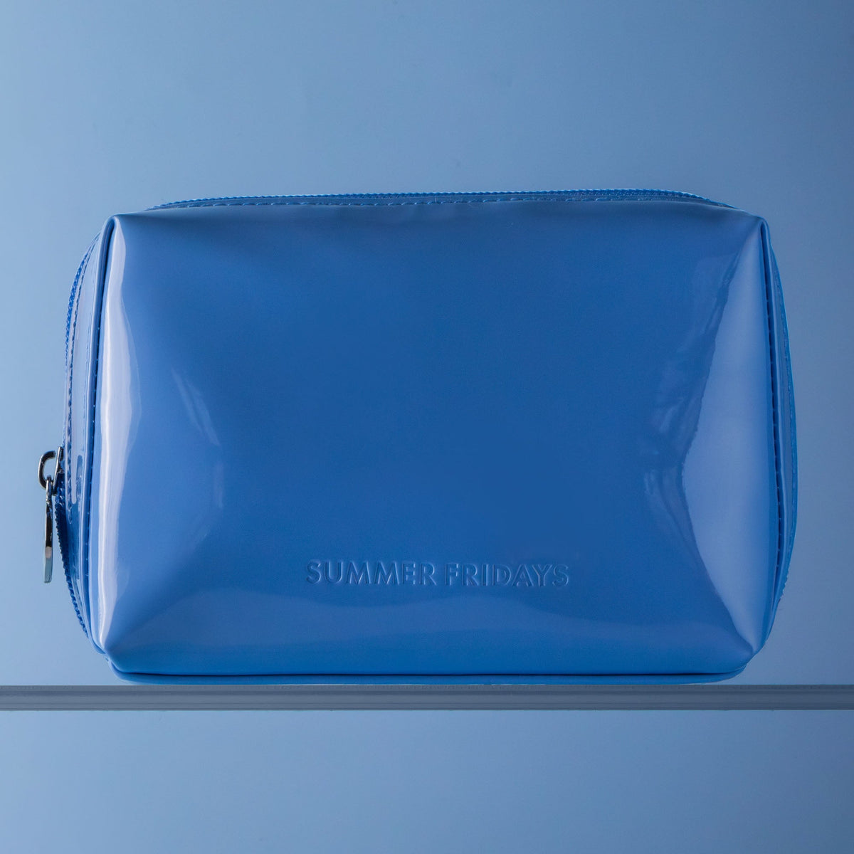 glossy-pouch-in-jet-lag-blue-o0 Glossy-Pouch-Jet-Lag-2.jpg