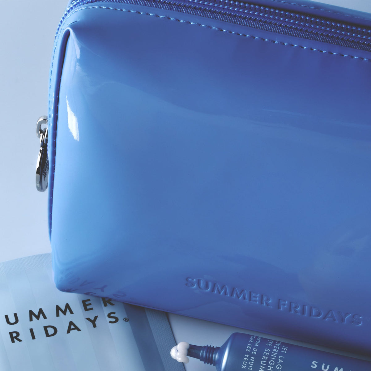 glossy-pouch-in-jet-lag-blue-o0 Glossy-Pouch-Jet-Lag.jpg